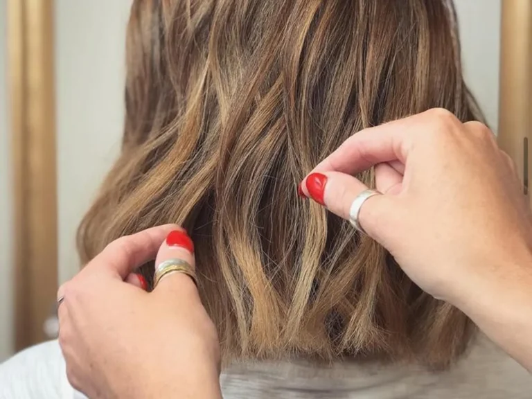 Close-up of balayage finishing touches being applied, hair colour by Abi Clark, Horsham, West Sussex