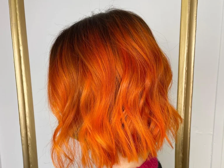 Bright copper wavy lob haircut and colour by Abi Clark, Horsham, West Sussex