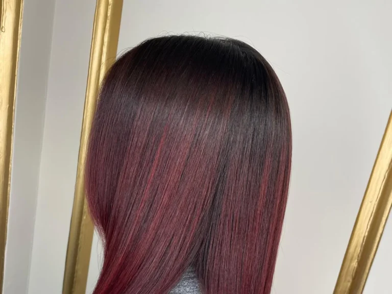 Brunette hair with red balayage waves by Abi Clark, Horsham, West Sussex