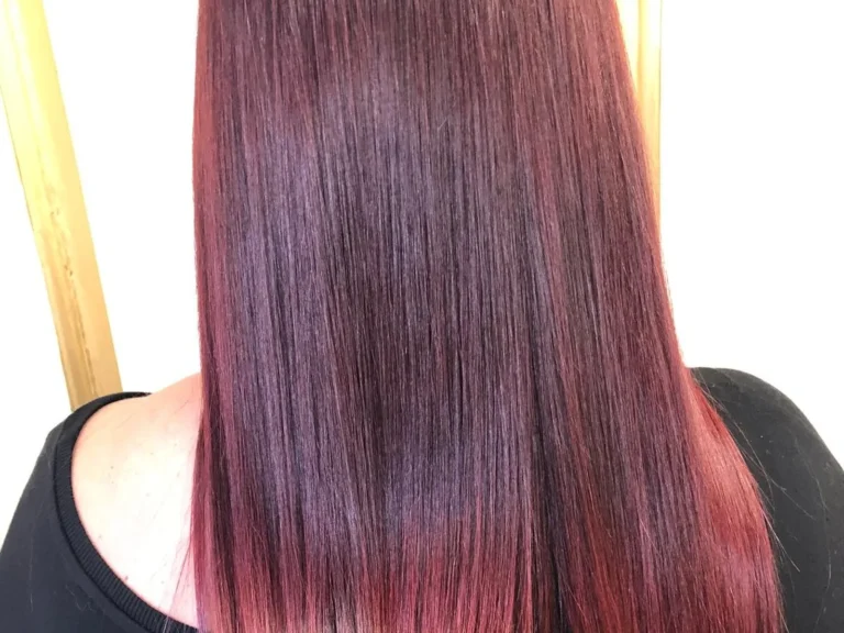 Sleek burgundy red hair colour by Abi Clark, Horsham, West Sussex