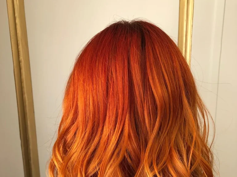 Vivid orange copper lob haircut and colour by Abi Clark, Horsham, West Sussex